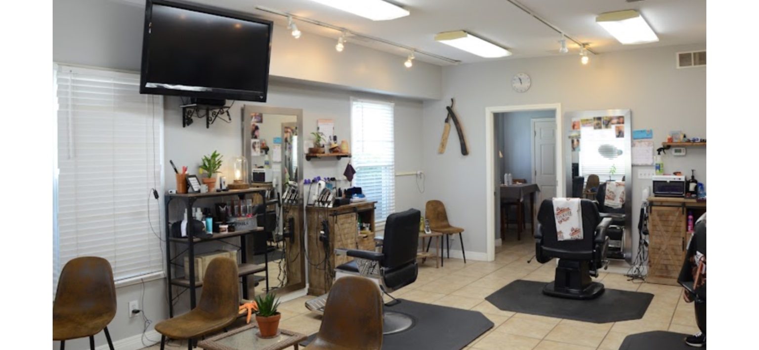 Interior of Buckner Barber Shop showing barber chairs and work stations